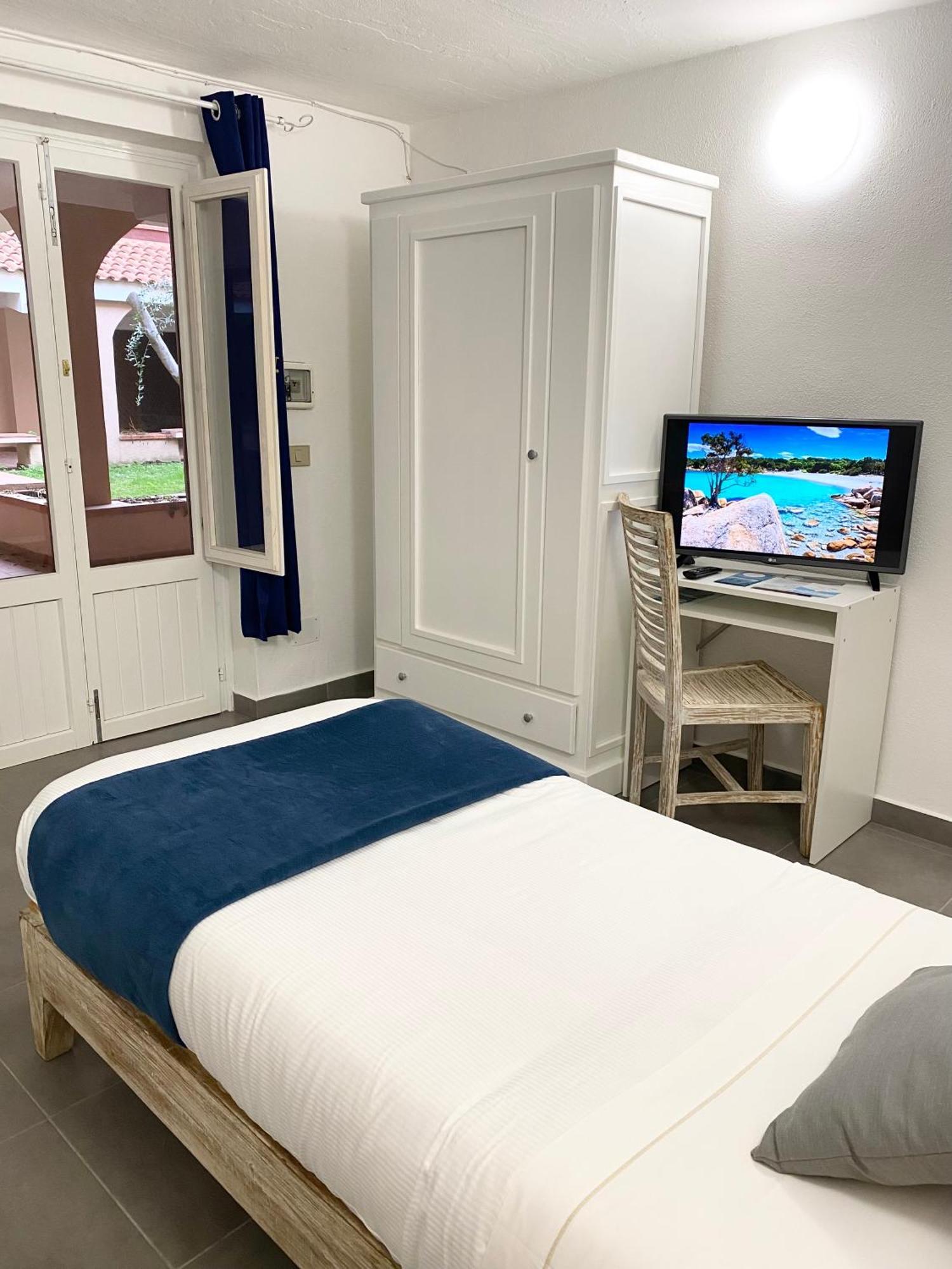 Cala Reale Rooms Marinella مارينيلاّ المظهر الخارجي الصورة